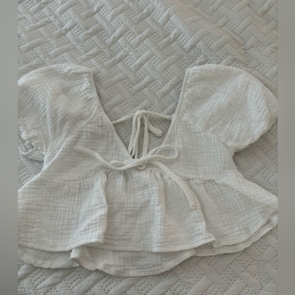 Francesca’s white blouse top